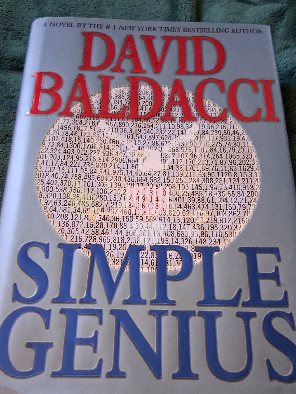 David Baldacci "Simple Genius" Hardcover Novel - Red & Blue Text
